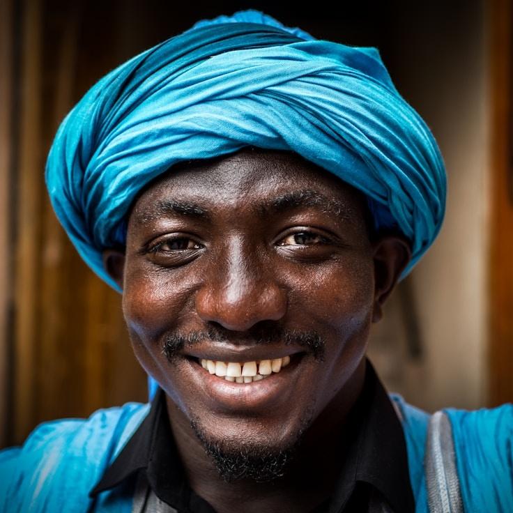 Kaveri Mehta, Lead Design Curator at SimpleHarborZen, reviewing corporate floral arrangements